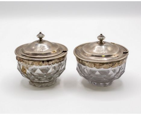 A pair of George III silver lidded cut glass bowls, Robert Garrard I, London 1805, crested marks to lid, 10cm diameter, 9cm h