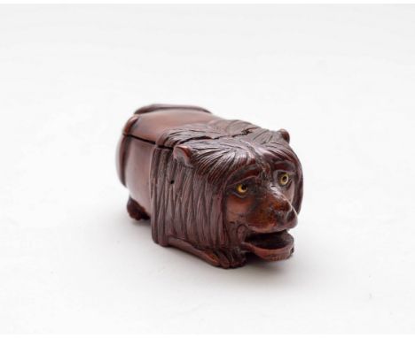 A coquilla nut lion snuff box, 19th Century, crouching lion with eyes, 8cm long  CONDITION REPORT: Condition information is n