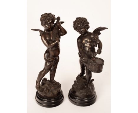 After Moreau/Musical Cherubs/a pair/bronzes, 34cm high CONDITION REPORT: Rubbing and scratches throughout, flecks of paint. R