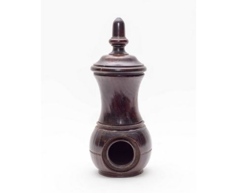 A treen lignum vitae coffee grinder, 19th Century, baluster shaped, 21cm high CONDITION REPORT: Condition information is not 