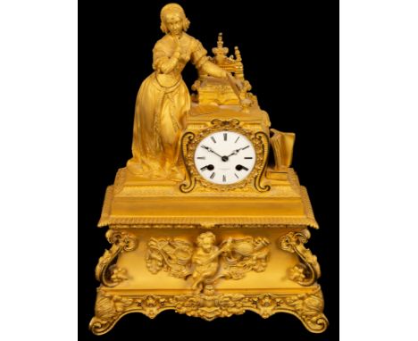 A 19th Century gilt metal mantel clock, Maurice Marx, Paris, with twin-train movement, Roman numerals and decorated a figure 