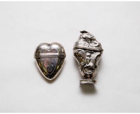 A Continental white metal trinket box, unmarked, 19th Century, of heart-shape and engraved decoration with initials, gilt int