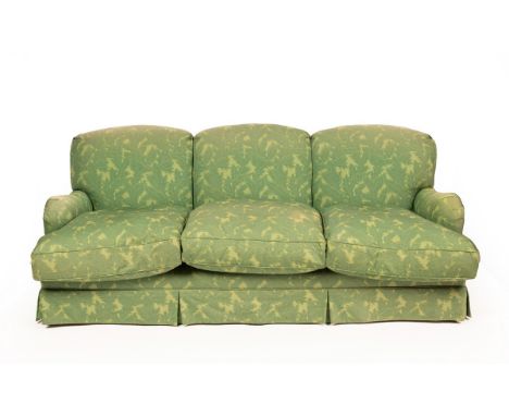 An upholstered three seater sofa, on turned front legs with castors, 213cm wide, 113cm deep, 83cm high CONDITION REPORT: Cond