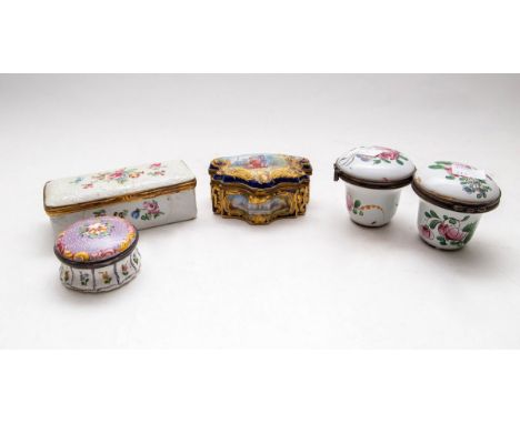 An enamel rectangular trinket box, 12cm wide, a French enamel pill box, a Sèvres style box and a pair of faience boxes CONDIT