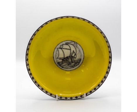A Royal Worcester circular bowl with central medallion of a galleon, after Walter Crane, within a diaper border, 21cm diamete