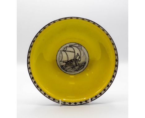 A Royal Worcester circular bowl with central medallion of a galleon, after Walter Crane, within a diaper border, 21cm diamete