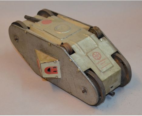 Marx Toys (Dudley) Tank: pressed-steel First World War tank, silver with wooden and tinplate rollers, clockwork with fixed ke