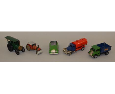 Five Triang Minic models including: Tanker in blue and red; Tipper Truck in green and blue; Streamline Sports Car in green wi