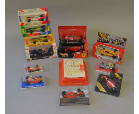 13x assorted diecast model racing cars including: Burago; Polistil; Mattel Hot Wheels; Onyx Etc. All boxed, overall G-VG.