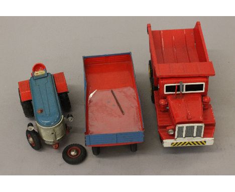 Sanesu (SSS, Japan) Heavy Duty Dump Truck: red tinplate model with yellow hubs, rubber tyres, friction drive front wheels, le