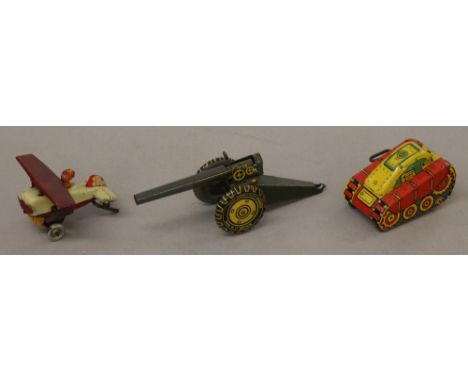 Two Marx Toys (Gt.Britain) Tinplate Models: Tank, clockwork with fixed key, red and yellow, '5' to front, length 10cm (G, mot