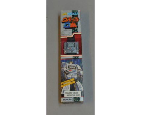 Takara (Japan) Microchange MC-06 Watch Robo, pre-G1 Transformers item, chrome with black strap. E in G+ box, some scuffs to e