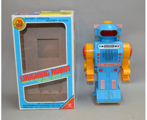 Yonezawa (Japan) Laughing Robot, battery operated robot, plastic, blue body with yellow arms. VG, slightly grubby, no corrosi