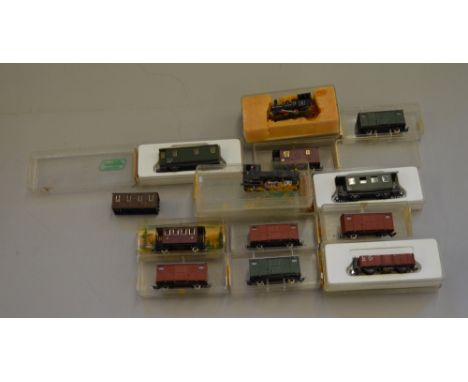 HOe / 009 scale:- Lilliput 0-6-2 steam tank loco, Minitrains 0-4-0 Saddle tank steam loco, together with 10 x rolling stock b