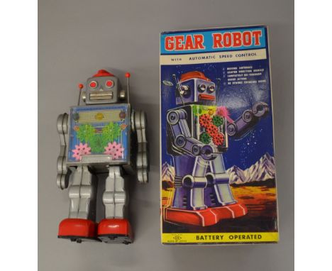 SH Horikawa (Japan) Gear Robot: battery operated, silver tinplate body with red feet and speed dial to head, clear chest pane