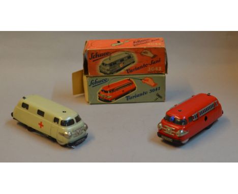 Two Schuco Emergency Vehicles: 3043 Varianto-Sani Ambulance, off-white with red cross to both sides and rear doors, length 11