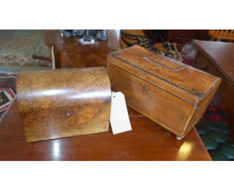 A Regency mahogany tea caddy with boxwood inlay, together with a Victorian burr walnut dome top tea caddy 