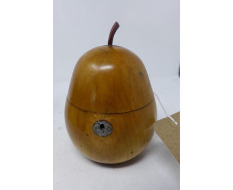 An early 20th century Georgian style walnut tea caddy, in the form of a pear, H.15cm