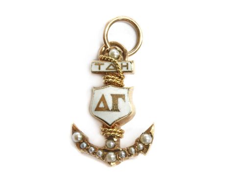 An American gold enamel and split pearl Delta Gamma sorority charm, later converted from a pin, the anchor grain set with spl