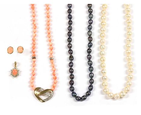 A single row uniform coral bead necklace, seventy coral beads, 6.0 to 6.2mm in size, strung knotted to a 9ct gold openwork he
