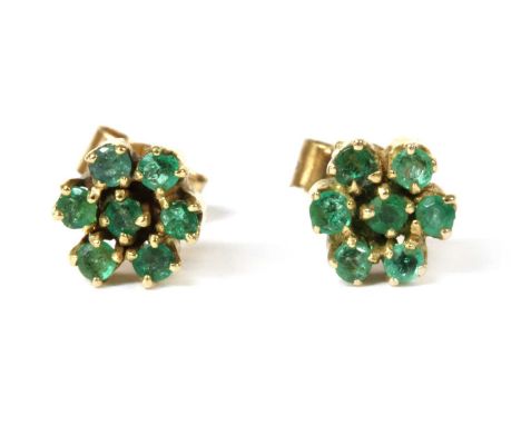 A pair of gold emerald cluster earrings, a cluster of round mixed cut emeralds, claw set, to post and butterfly fittings, tes