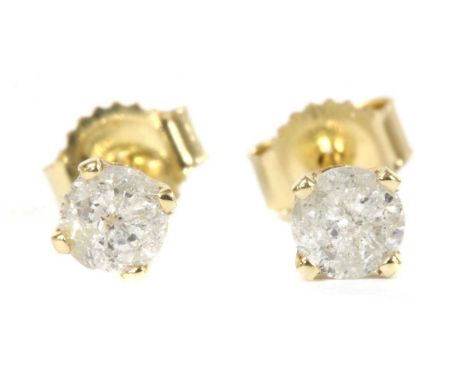 A pair of gold single stone diamond stud earrings, a brilliant cut diamond, four claw set, to post and butterfly fittings, ma