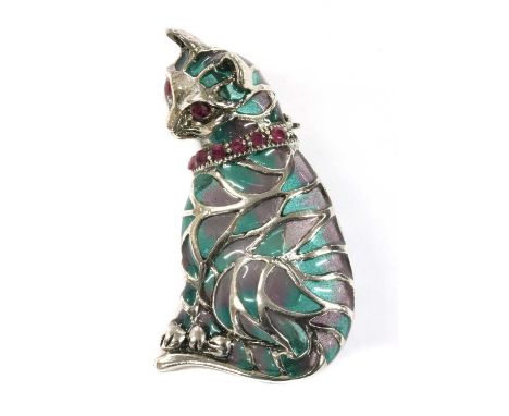 A silver plique-à-jour enamel and ruby cat brooch/pendant, with green and red plique-à-jour enamel to the body, to ruby set e