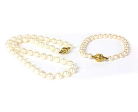 A single row uniform cultured pearl necklace, forty five cultured pearls, 7.3 to 7.7mm, stung knotted to 9ct gold safety clas