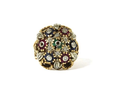 A gold diamond, emerald, ruby and sapphire bombé cluster ring, with eight cut diamond and circular mixed cut gemstone cluster