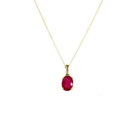 A gold single stone ruby pendant, an oval mixed cut ruby, possibly fracture filled, approximately 7 x 5mm, claw set to an art