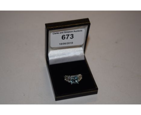 A silver and aquamarine set ring 
