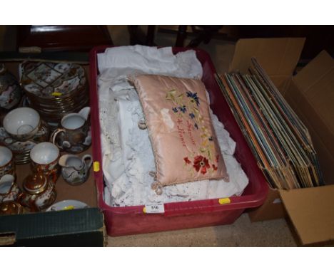 A box of lace and textiles; and a French souvenir silk