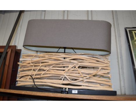 A driftwood lamp and shade 