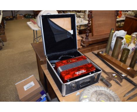 A Chanson accordion in carrying case