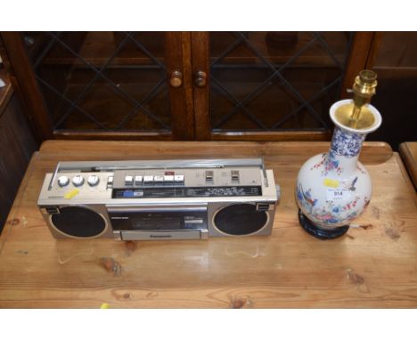 A Panasonic radio cassette player and a china table lamp base 