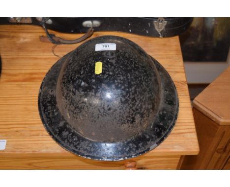 A WW2 ARP wardens helmet 