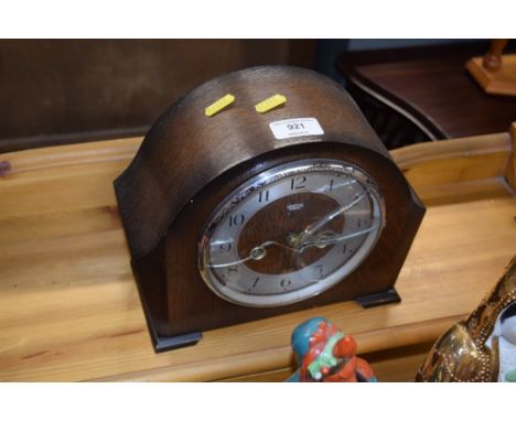 A Smiths oak cased two hole mantle clock 