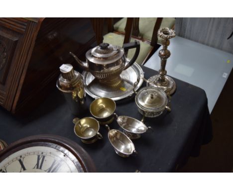 A quantity of silver plated ware to include salt cellars, half fluted tea pot,a salver, candlestick, cocktail shaker etc. 