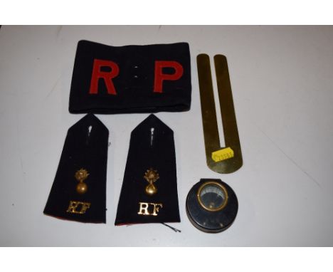 A WW2 period compass; together with a pair of epaulettes; a button polisher etc. 