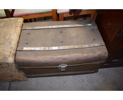 A tin trunk 