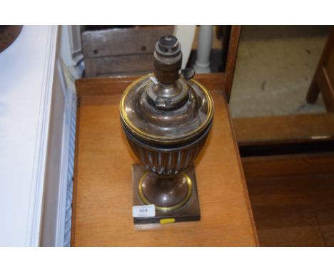 A brass lamp base 