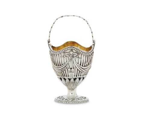 A GEORGE III SILVER PEDESTAL SUGAR BASKETAPPARENTLY NO MAKER'S MARK, LONDON 1775With a pierced meander swing handle, a beaded