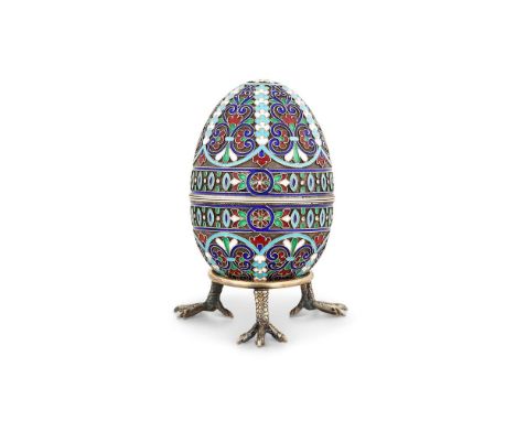 A RUSSIAN SILVER GILT AND CLOISONNÉ ENAMEL EGG BY GUSTAV KLINGERT 1908-26 MOSCOW KOKOSHNIK MARK 84 ZOLOTNIKI Painted with pan