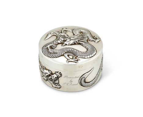 A CHINESE EXPORT SILVER CIRCULAR TABLE BOX BY WANG HING & CO.HONG KONG, CANTON & SHANGHAI (WH, 90, CHOP MARK) FL. CIRCA 1854-