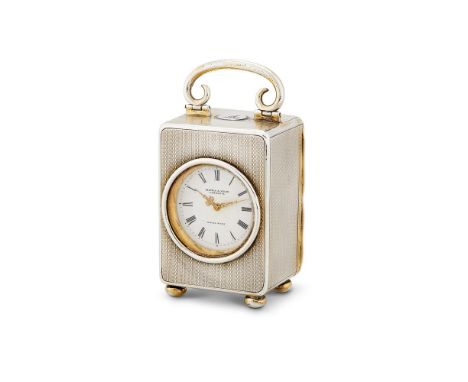 A LATE VICTORIAN SILVER CASED BOUDOIR TIMEPIECE BY MAPPIN & WEBB LONDON 1900 The 3.5cm white dial with black Roman numerals, 