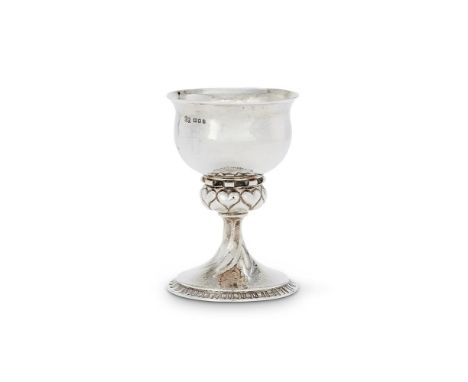 AN ARTS AND CRAFTS HAMMERED SILVER GOBLET BY OMAR RAMSDENLONDON 1924Engraved Omar Ramsden me fecit, with an everted rim to th