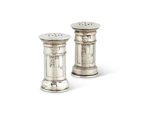 A PAIR OF EDWARDIAN SILVER NOVELTY PEPPERETTES BY WILLIAM HUTTON & SONS LTDBIRMINGHAM 1907Modelled as pillar post-boxes, 5cm 