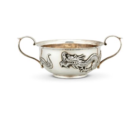 A CHINESE EXPORT SILVER CIRCULAR TWIN HANDLED BOWL BY WANG HING & CO.HONG KONG, CANTON & SHANGHAI (CHOP MARK, WH90) FL. CIRCA