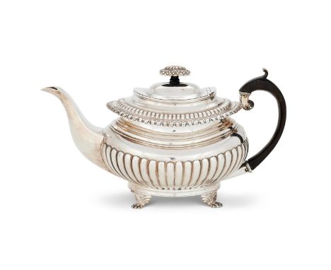 AN INDIAN COLONIAL SILVER OBLONG BALUSTER TEA POT BY HAMILTON & CO.CALCUTTA, CIRCA 1830With a lobed oblong finial to the dome