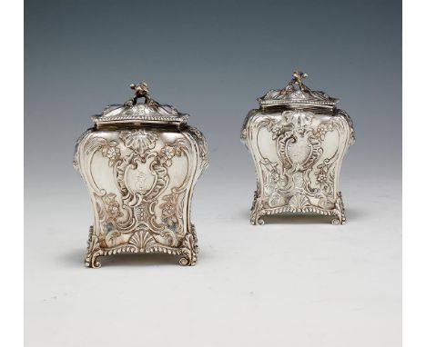 A PAIR OF EARLY GEORGE III SILVER BOMBÉ TEA CADDIES BY EMICK ROMERLONDON 1762With flower finials to the quartered slightly do